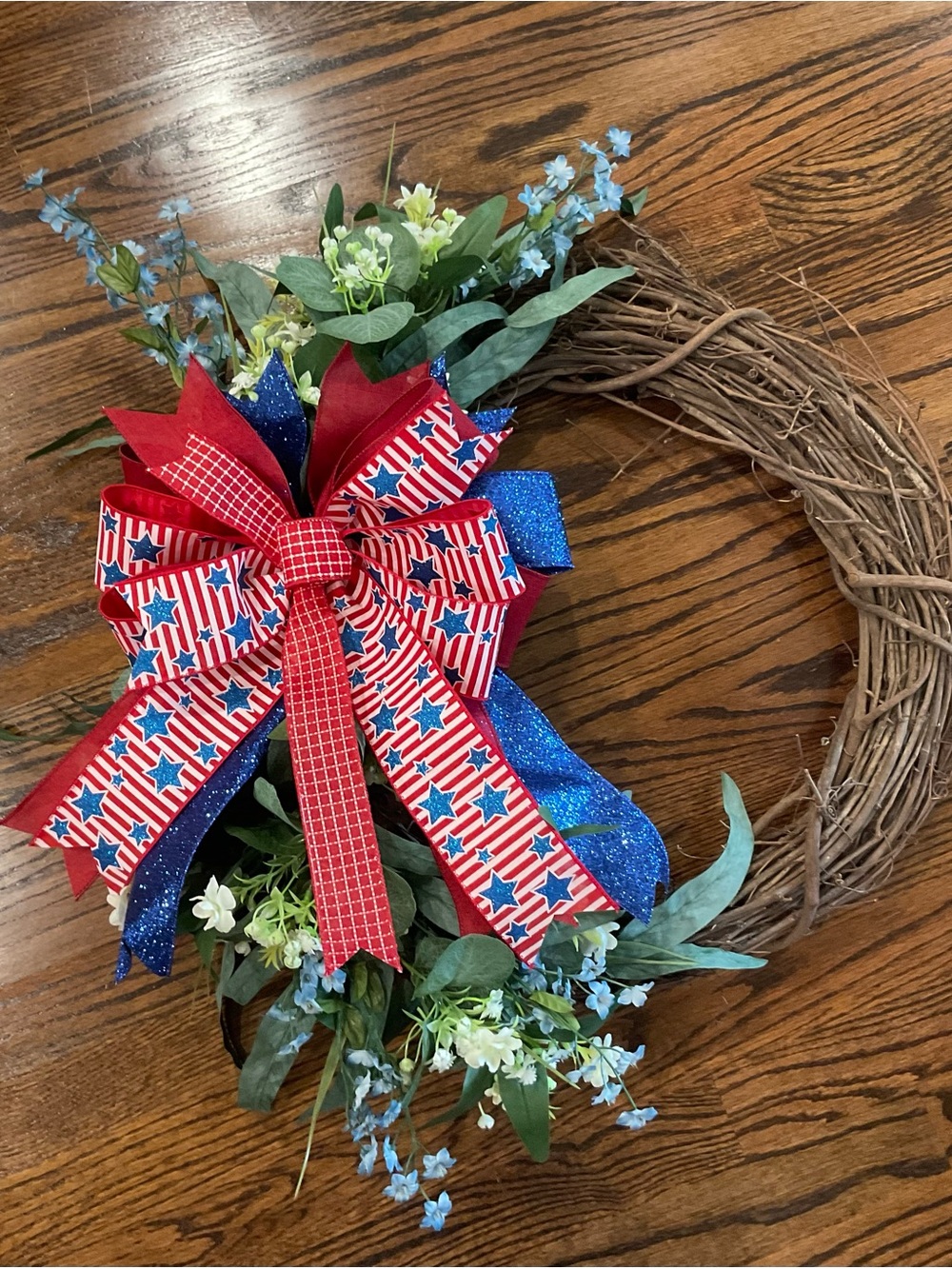 Patriotic Red Blue Floral Grapevine Wreath with Ribbon Bow